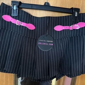 Dolls Kill X Hustler  Black Pinstripe Skirt with Pink Buckles & Rhinestone Logo